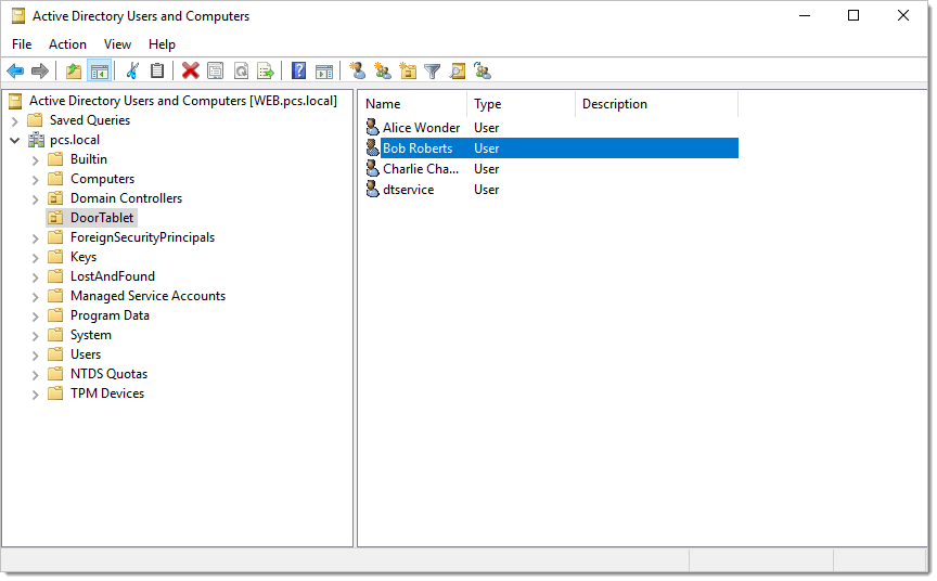 In the example below we show a small OU, called DoorTablet, with three users and a service account...